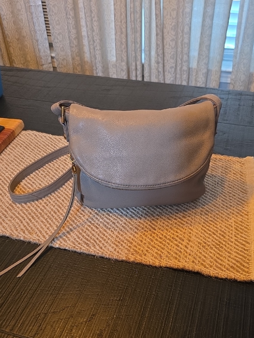 HOBO Fern Foldover Messenger crossbody bag.